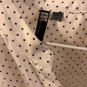 White and black polka dot shirt